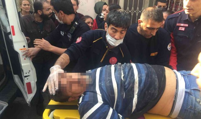 Ölmek isteyen genç yardıma gelen vatandaşın üzerine düşerek kurtuldu