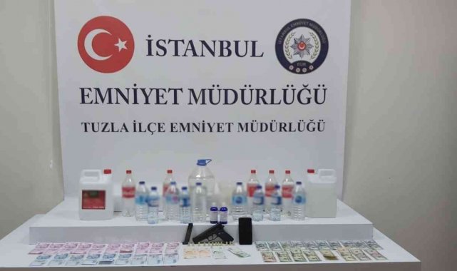 Tuzla'da sahte alkol imalatı ve satışının yapıldığı iş yerine operasyon