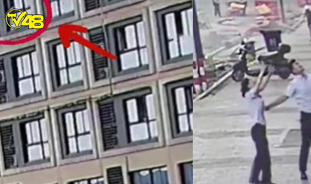 Çin'de mucize anları! 5. kattan düşen 2 yaşındaki çocuğu havada yakalayarak kurtaran adam "kahraman" ilan edildi