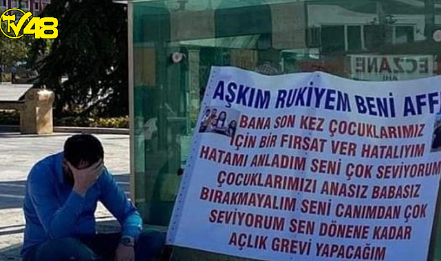 Kırşehir'de bir adam, kendisini terk eden eşinden pankart açıp özür diledi