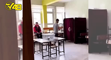 BİR VATANDAŞ OY KULLANIRKEN "YA HAK" DİYE BAĞIRDI