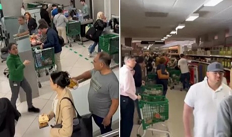 ELEKTRİKSİZ KALAN İSPANYA'DA HALK MARKETLERE HÜCUM ETTİ